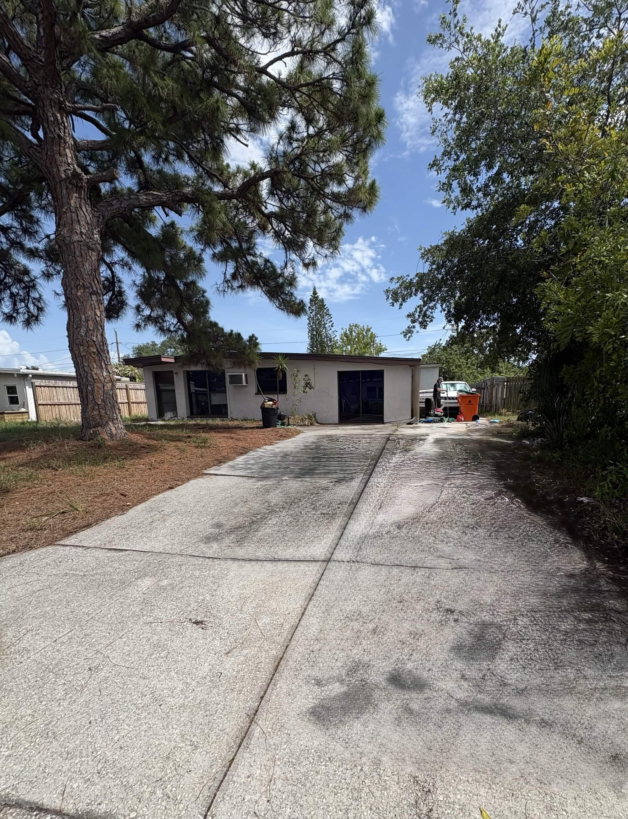 Driveway before pressure washing